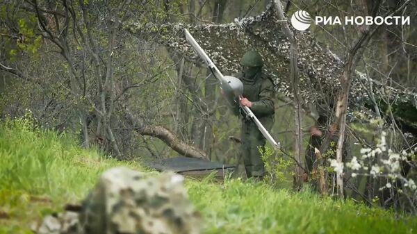 Кадры работы российской армии в зоне СВО показали во время трансляции парада ко Дню Победы  - Sputnik Литва
