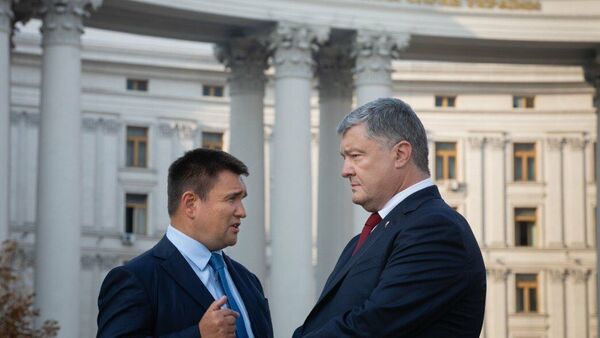 Петр Порошенко и министр иностранных дел Украины Павел Климкин, архивное фото - Sputnik Литва