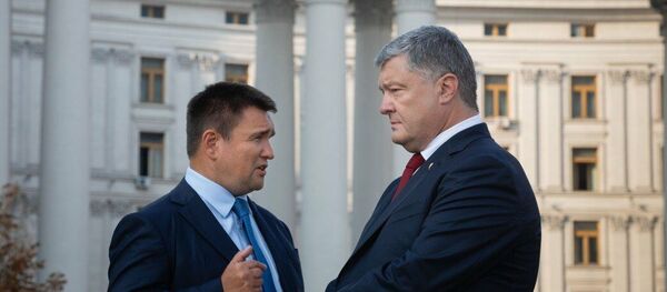 Петр Порошенко и министр иностранных дел Украины Павел Климкин, архивное фото - Sputnik Литва