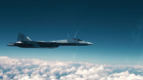 Smūginė sandrauga: Su-57 ir bepilotis Ochotnik Smūginė sandrauga: Su-57 ir bepilotis Ochotnik - Sputnik Lietuva