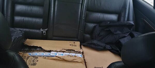 Kontrabandinės cigaretės automobilyje Audi A6 - Sputnik Lietuva