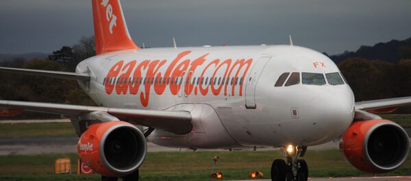 Самолет авиакомпании EasyJet в аэропорту Манчестера, архивное фото Самолет авиакомпании EasyJet в аэропорту Манчестера, архивное фото - Sputnik Литва