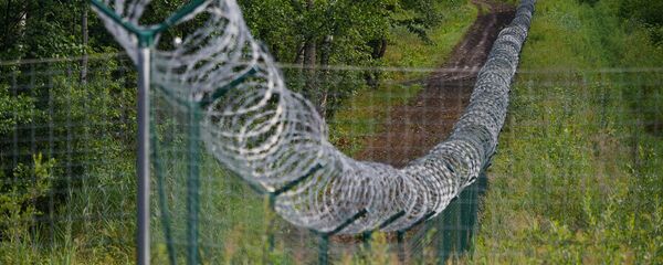 Забор на границе Латвии и России Забор на границе Латвии и России - Sputnik Lietuva