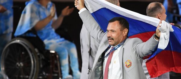 Российский флаг на открытии ХV летних Паралимпийских игр 2016 в Рио-де-Жанейро Российский флаг на открытии ХV летних Паралимпийских игр 2016 в Рио-де-Жанейро - Sputnik Lietuva