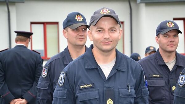 Победителем конкурса на звание спасателя года стал Ремигиюс Бальчюнас из управления противопожарной безопасности Шяуляйского уезда - Sputnik Литва