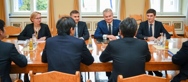 Президент Литвы Гитанас Науседа встретился с представителями Японского банка международного сотрудничества - Sputnik Литва