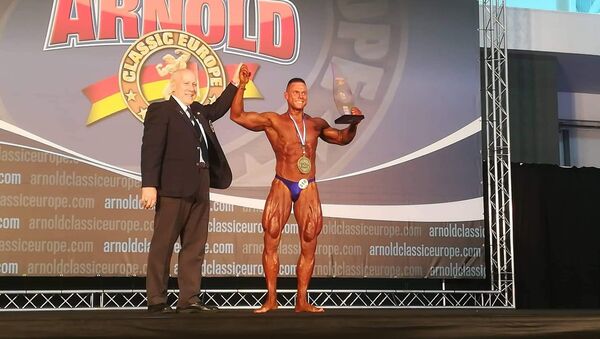 Победитель в категории Classic Bodybuilding литовский атлет Томас Кайрис - Sputnik Литва