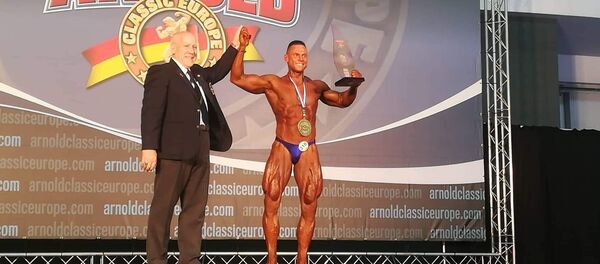 Победитель в категории Classic Bodybuilding литовский атлет Томас Кайрис - Sputnik Литва