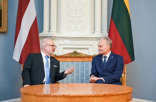 Литва и Латвия обсудили торговлю электроэнергией через российскую границу Литва и Латвия обсудили торговлю электроэнергией через российскую границу - Sputnik Литва