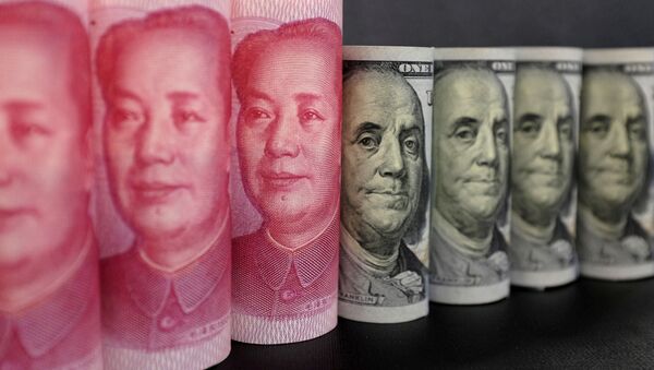 Американский доллар и китайский юань, архивное фото - Sputnik Lietuva