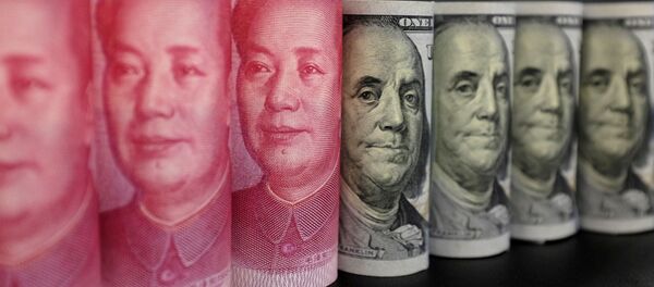 Американский доллар и китайский юань, архивное фото Американский доллар и китайский юань, архивное фото - Sputnik Lietuva