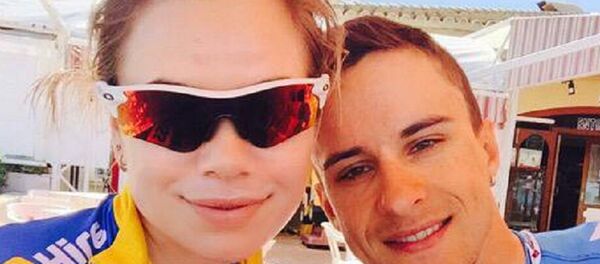 литовские велогонщики Игнатас Коноваловас и Эдита Янелюнайте литовские велогонщики Игнатас Коноваловас и Эдита Янелюнайте - Sputnik Литва