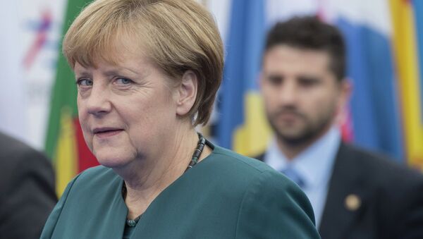 Федеральный канцлер Германии Ангела Меркель перед началом заседания саммита форума Азия-Европа - Sputnik Lietuva