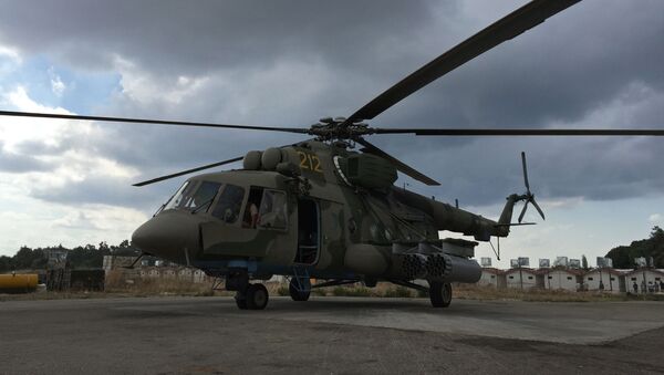 Российский транспортно-штурмовой вертолет МИ-8АМШТ на аэродроме Хмеймим в Сирии, архивное фото - Sputnik Lietuva
