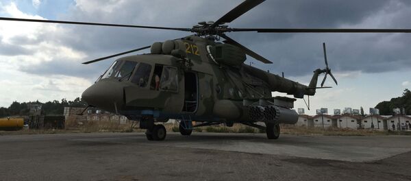 Российский транспортно-штурмовой вертолет МИ-8АМШТ на аэродроме Хмеймим в Сирии, архивное фото - Sputnik Литва