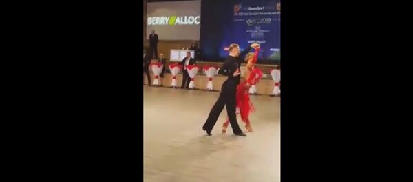 Литовская пара в спортивных танцах Каролис Бурнекис / Изабеле Шекайте - Sputnik Литва