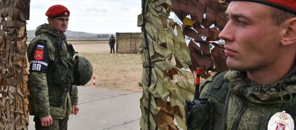 Rusijos karo policijos pareigūnai Rusijos karo policijos pareigūnai - Sputnik Lietuva