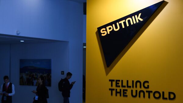 Логотип международного информационного агентства и радио Sputnik, архивное фото - Sputnik Литва