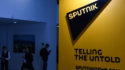 Логотип международного информационного агентства и радио Sputnik, архивное фото