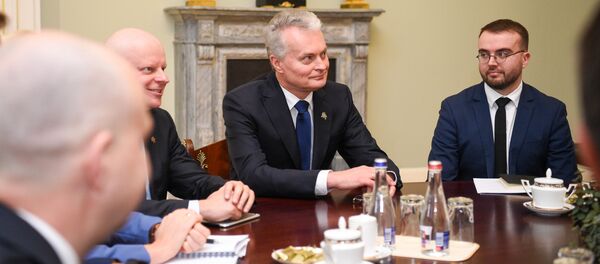 Президент Литвы Гитанас Науседа обсуждает управление чрезвычайными ситуациями - Sputnik Литва