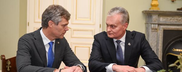 Президент Литвы Гитанас Науседа и глава ДГБ Дарюс Яунишкис - Sputnik Литва