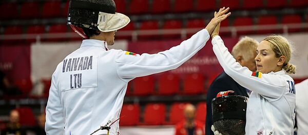 Аурелия Тамашаускайте и Давид Вайвада на Чемпионате Европы в Польше, 24 ноября 2019 года - Sputnik Литва