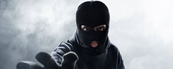 Человек в маске грабителя, архивное фото - Sputnik Литва