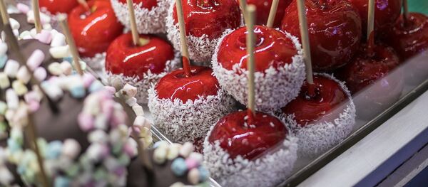 Яблоки в сахарной глазури, архивное фото - Sputnik Литва