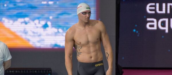 Литовский пловец Симонас Билис - Sputnik Литва