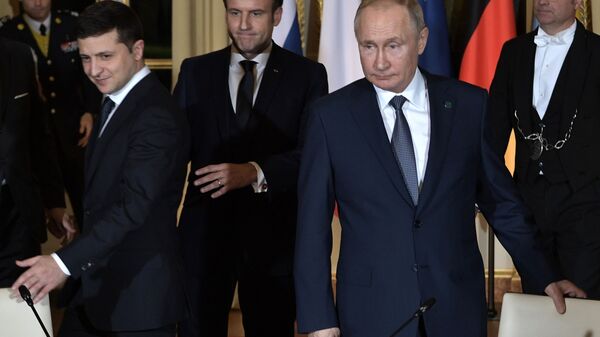 Rusijos prezidentas Vladimiras Putinas, Prancūzijos prezidentas Emanuelis Makronas ir Ukrainos prezidentas Vladimiras Zelenskis susitikimo Normandijos formatu metu - Sputnik Lietuva