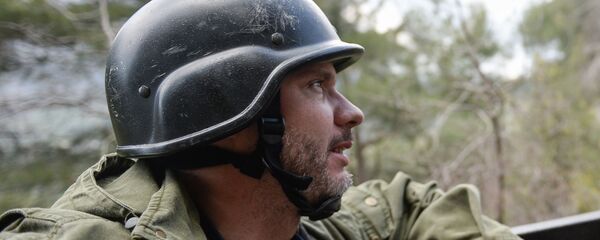 Фотокорреспондент Андрей Стенин - Sputnik Литва