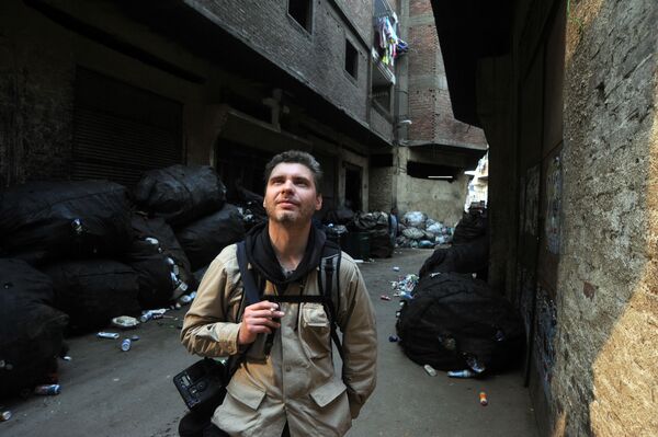 Фотокорреспондент Андрей Стенин на улице Каира - Sputnik Литва