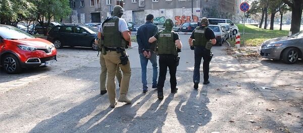 Пограничники Польши, Литвы и Латвии задержали 13 россиян по подозрению в контрабанде людей Пограничники Польши, Литвы и Латвии задержали 13 россиян по подозрению в контрабанде людей - Sputnik Литва