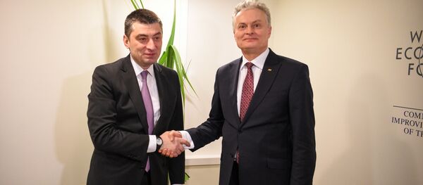 Lietuvos prezidentas Gitanas Nausėda su  Gruzijos ministru pirmininku  Georgijumi Gacharija - Sputnik Lietuva