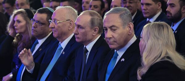 Президент РФ Владимир Путин на церемонии открытия памятника жителям и защитникам блокадного Ленинграда Свеча памяти на территории парка Сакер в Иерусалиме, 23 января 2020 Президент РФ Владимир Путин на церемонии открытия памятника жителям и защитникам блокадного Ленинграда Свеча памяти на территории парка Сакер в Иерусалиме, 23 января 2020 - Sputnik Lietuva