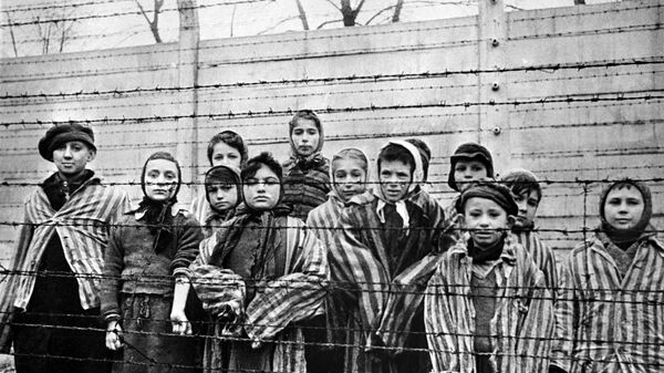 Дети, заключенные концентрационного лагеря Освенцим. - Sputnik Литва
