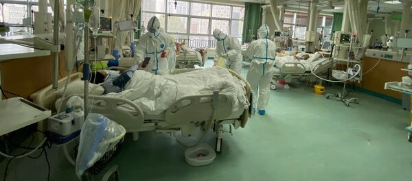 Лечение пациентов в центральной больнице города Ухань Лечение пациентов в центральной больнице города Ухань - Sputnik Литва