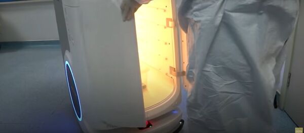 Kinijos ligoninė išsinuomojo robotus vaistų pristatymui Kinijos ligoninė išsinuomojo robotus vaistų pristatymui - Sputnik Lietuva