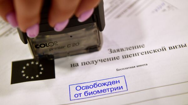 Печать Освобождение от биометрии на заявление на получение шенгенской визы, архивное фото - Sputnik Литва