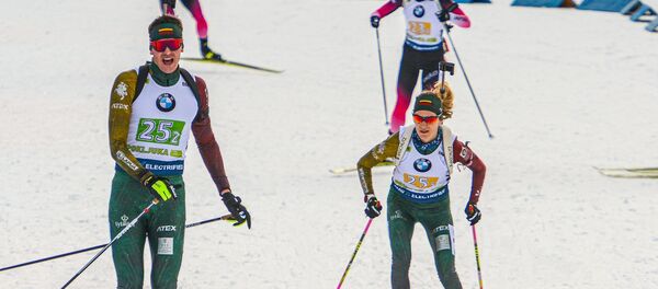 Литовские биатлонисты на соревнованиях, архивное фото - Sputnik Литва