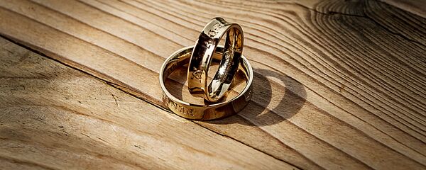 Обручальные кольца, архивное фото Обручальные кольца, архивное фото - Sputnik Lietuva