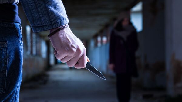 Нож в руке мужчины, архивное фото - Sputnik Литва
