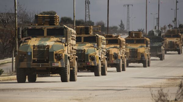 Турецкий военный конвой едет в провинцию Идлиб, Сирия, в субботу, 22 февраля 2020 года - Sputnik Литва