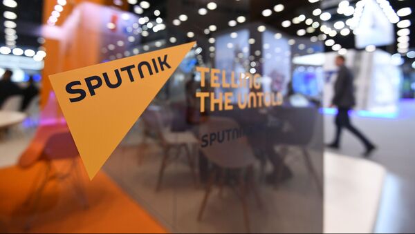 Стенд международного информационного агентства и радио Sputnik - Sputnik Литва