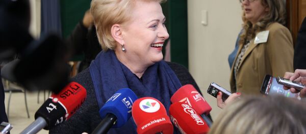 Улыбка президента Дали Грибаускайте - Sputnik Литва