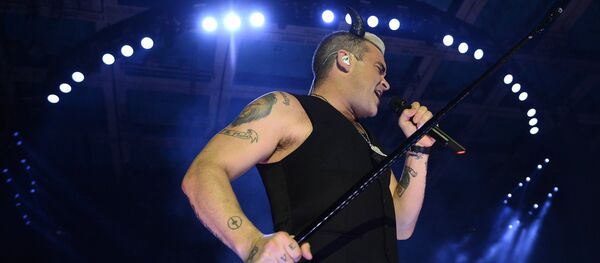 Концерт Робби Уильямса в Москве Концерт Робби Уильямса в Москве - Sputnik Литва