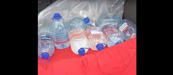 У жителя Шальчининкайского района обнаружено 318 литров самогона - Sputnik Литва