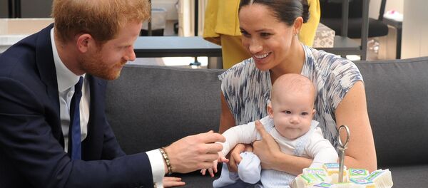 Megan Markl ir princas Haris su savo sūnumi Megan Markl ir princas Haris su savo sūnumi - Sputnik Lietuva