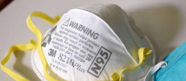 Респираторная маска N95 со специальной маркировкой в связи со вспышкой коронавируса, штат Миннесота, США 4 марта 2020 года Респираторная маска N95 со специальной маркировкой в связи со вспышкой коронавируса, штат Миннесота, США 4 марта 2020 года - Sputnik Литва