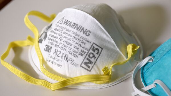 Респираторная маска N95 со специальной маркировкой в связи со вспышкой коронавируса, штат Миннесота, США 4 марта 2020 года - Sputnik Литва